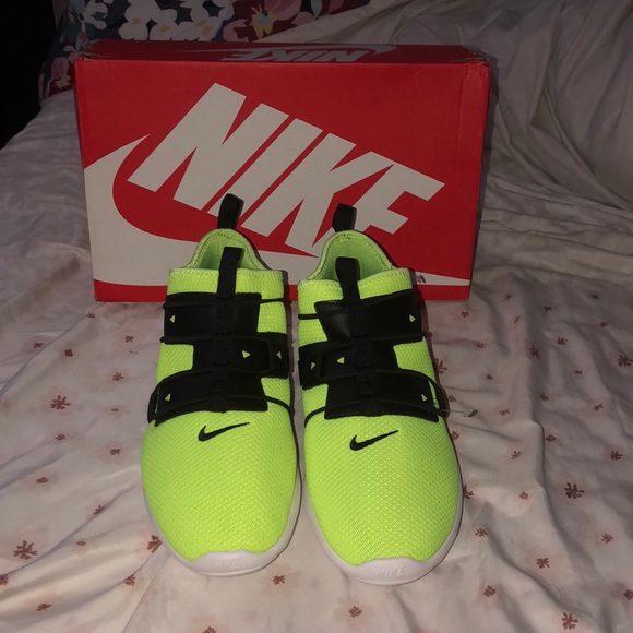 neon green and black sneakers